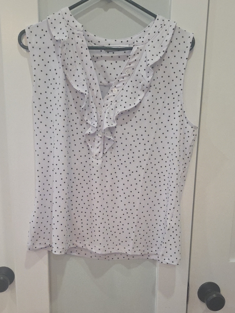 Ricki's White and Black Polka Dot Ruffle Sleeveless Top